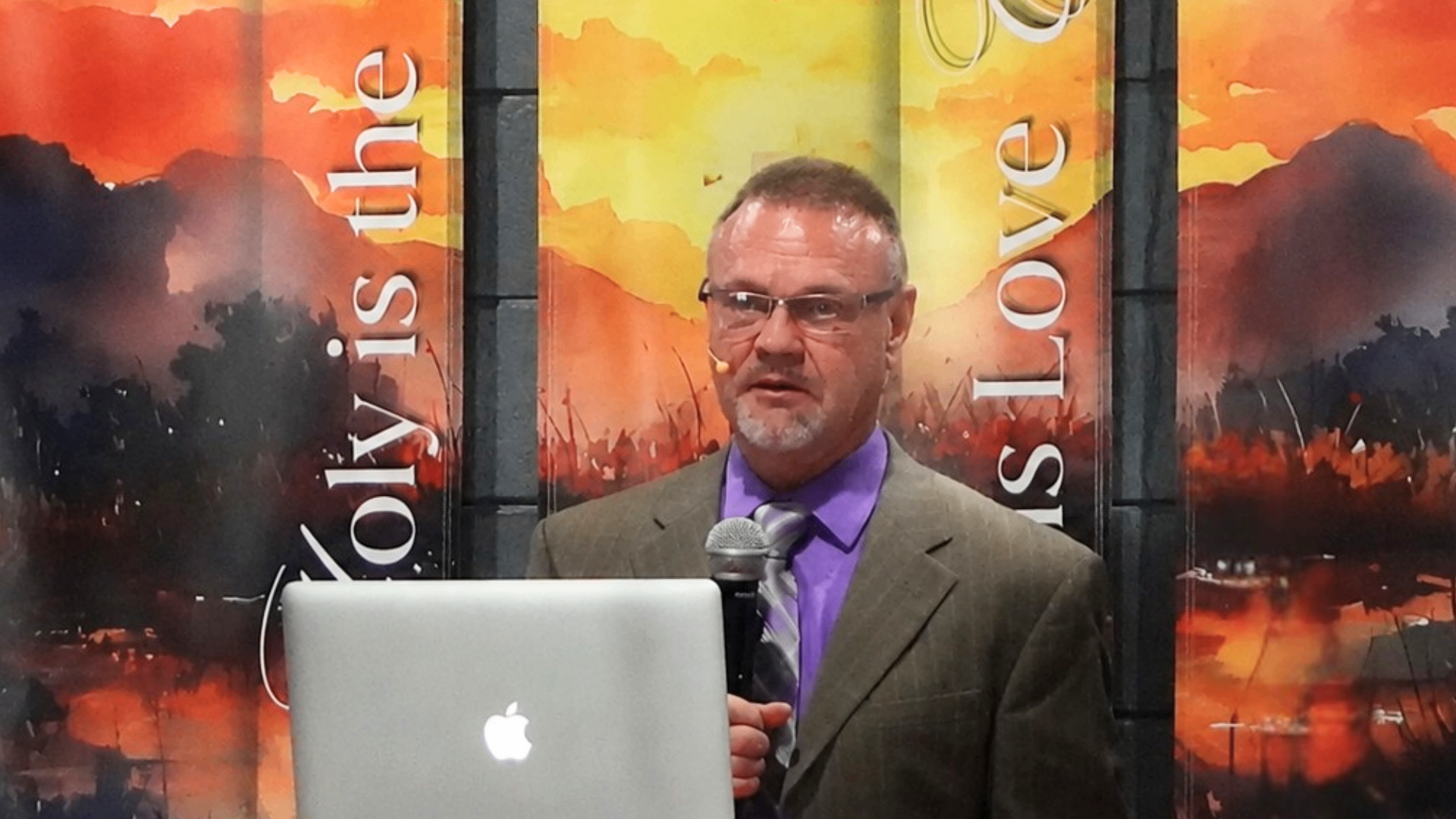 Pastor Ronald preaching